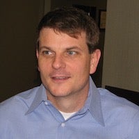 A headshot of David Betts